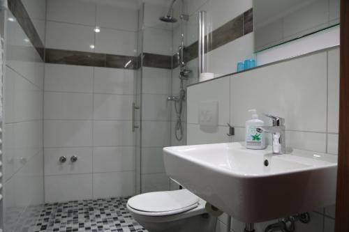 Koupelna v ubytování Hotel Mykonos