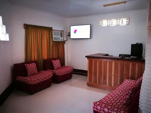 Televisyen dan/atau pusat hiburan di 8th Street Hostel
