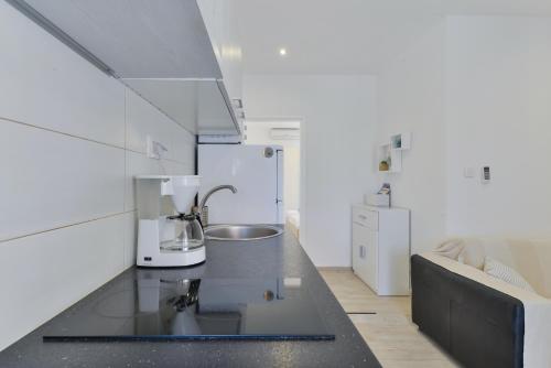 Kuchyňa alebo kuchynka v ubytovaní Apartments Keran