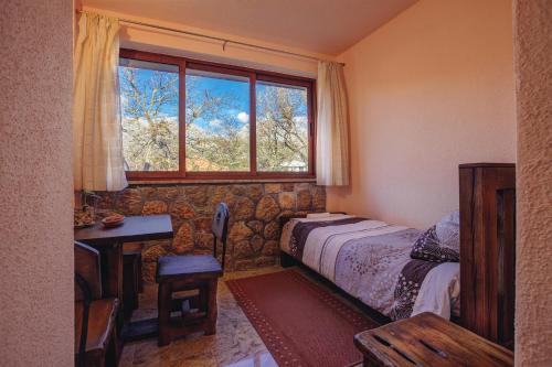 Postel nebo postele na pokoji v ubytování Apartmani i sobe Dinko