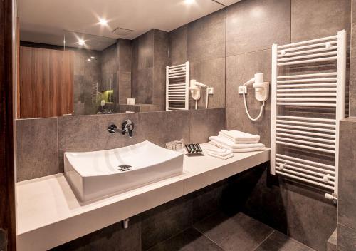 Kopalnica v nastanitvi Atelier Hotel