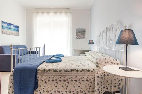 Ένα ή περισσότερα κρεβάτια σε δωμάτιο στο Casa di Nora