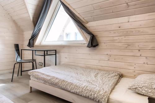 Postel nebo postele na pokoji v ubytování Villa Baltica
