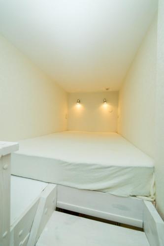 Ένα ή περισσότερα κρεβάτια σε δωμάτιο στο Apartment Smart