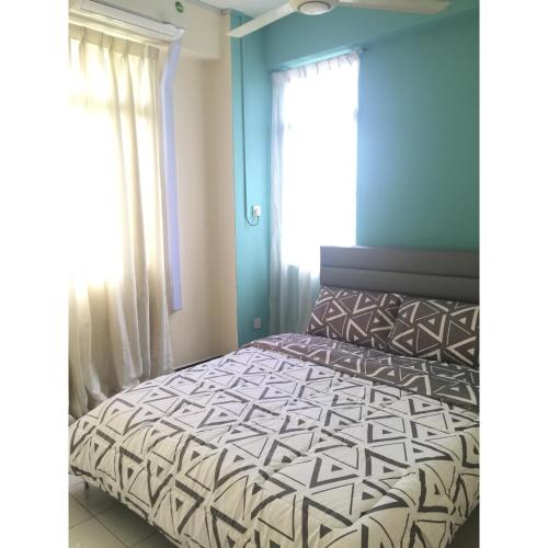 Letto o letti in una camera di 3BR Apartment at Kumbang Pasang BSB