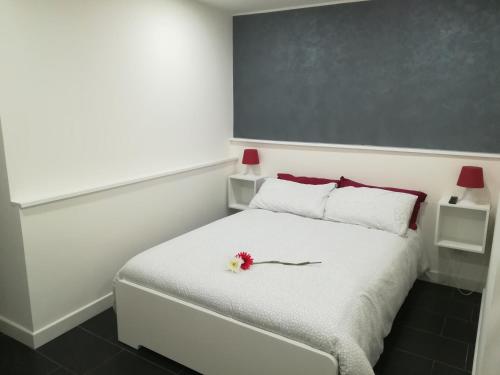Postel nebo postele na pokoji v ubytování Casa del Plebiscito