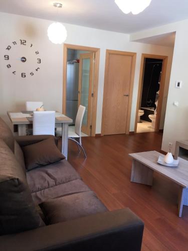 a living room with a couch and a table at P&C Areny in Canillo
