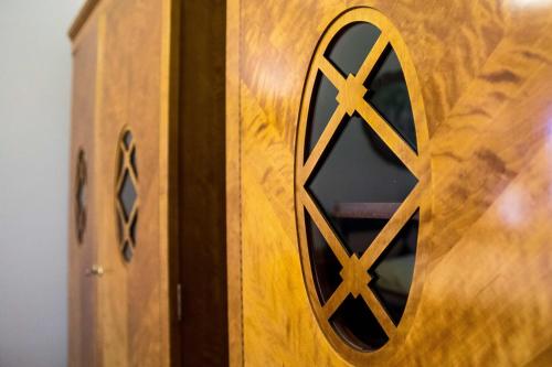 a wooden door with a window on it at Penzion Šatlava in Nové Město nad Metují