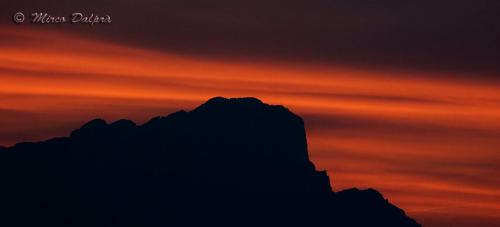 The sunrise or sunset as seen from a szállodákat or nearby