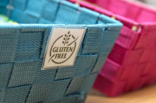 a lego container with a gluten free sticker on it at City Hotel & Suites in Foligno