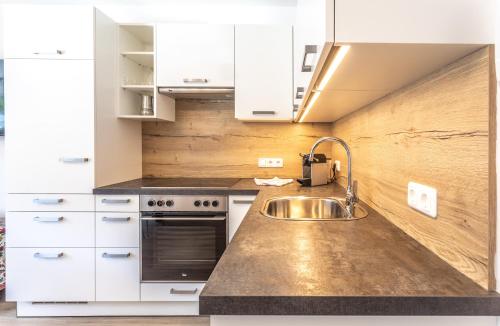 Apartment Hochpustertalにあるキッチンまたは簡易キッチン