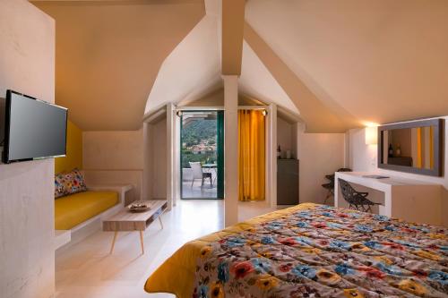 Ένα ή περισσότερα κρεβάτια σε δωμάτιο στο Ξενοδοχείο Ωκεανός