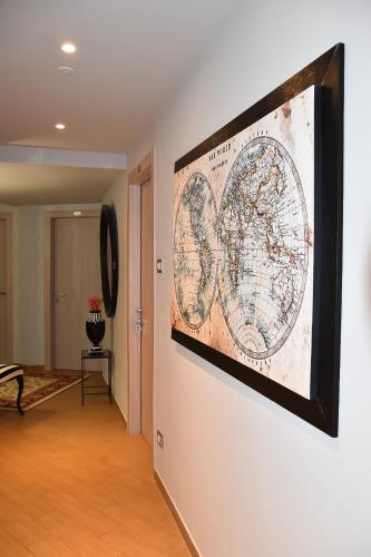 a large map hanging on a wall in a room at Residenza Ca' degli Enzi in Verona