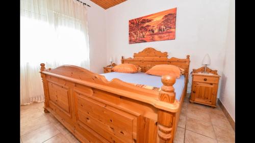 Postel nebo postele na pokoji v ubytování Čeprljanda Ugljan