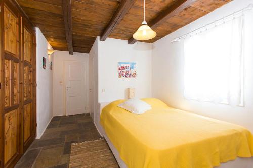 Letto o letti in una camera di Traditional Mykonian Villa