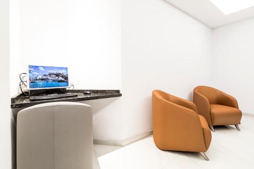TV a/nebo společenská místnost v ubytování Hostal Roca