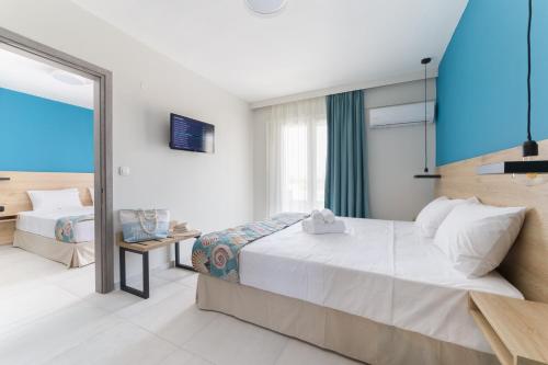 Katil atau katil-katil dalam bilik di Mythic Summer Hotel