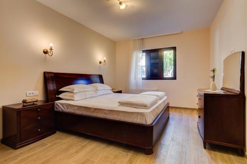 Кровать или кровати в номере Apartments MarijaZ 2