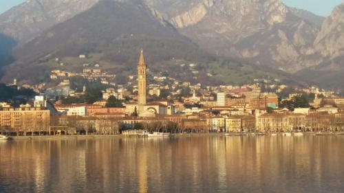 a city on the shore of a large body of water at Casa al Lago in Lecco