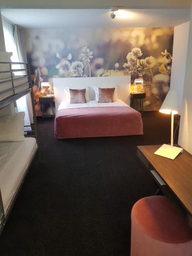 Łóżko lub łóżka w pokoju w obiekcie Hotel Herrloh