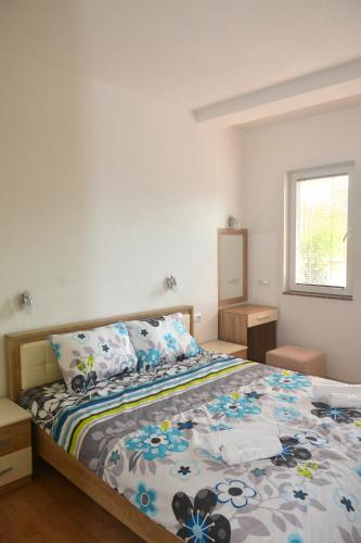 Katil atau katil-katil dalam bilik di Comfort Apartment