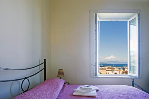 מיטה או מיטות בחדר ב-Bed and Breakfast La Torretta