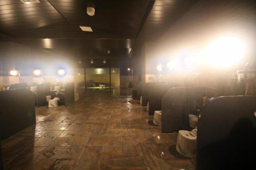 a room with a floor with a room with toilets at Hotel Route-Inn Sendai Higashi in Sendai
