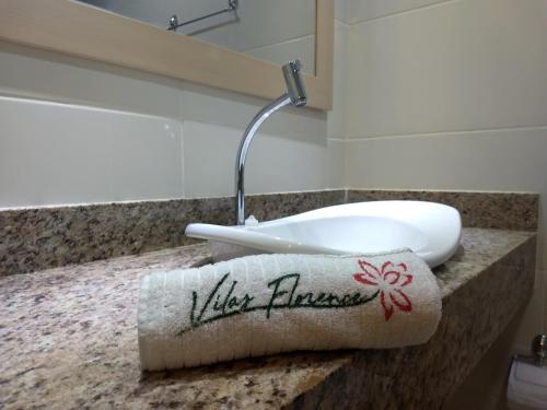 Ванная комната в Vilas Florence