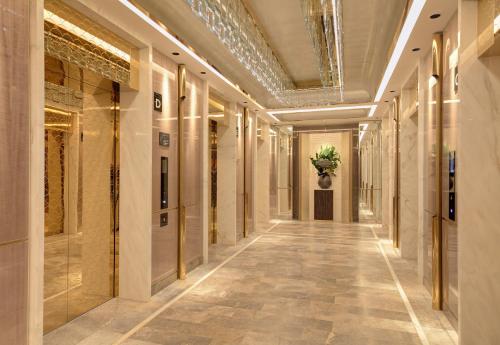 a hallway of a building with a plant on the ceiling at The Darling at The Star Gold Coast in Gold Coast