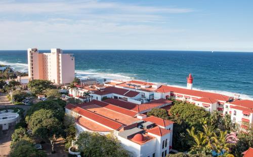 an aerial view of a city and the ocean at 801 Oyster Schelles - by Stay in Umhlanga in Durban