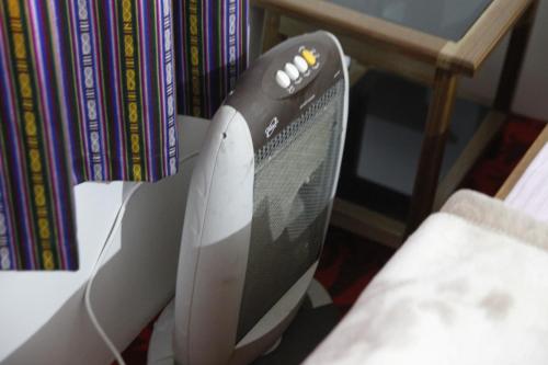a nintendo wii game system sitting on a table at Vamoose Sherpa Homestay in Ravangla