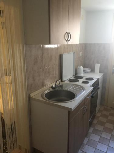 Η κουζίνα ή μικρή κουζίνα στο Apartmani Josipa