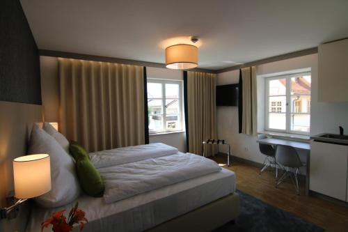 Postel nebo postele na pokoji v ubytování BA Hotel by WMM Hotels