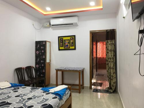 Jayaram Residency Srikalahastiにあるベッド