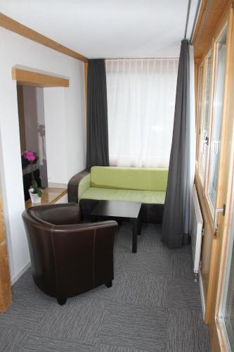 Postel nebo postele na pokoji v ubytování Hotel Sonnenhalde Wiesen