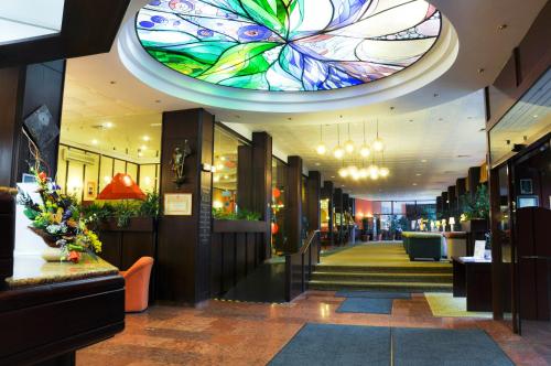 The lobby or reception area at Hotel Lövér Sopron