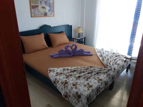 Tempat tidur dalam kamar di Villa Galaxidi