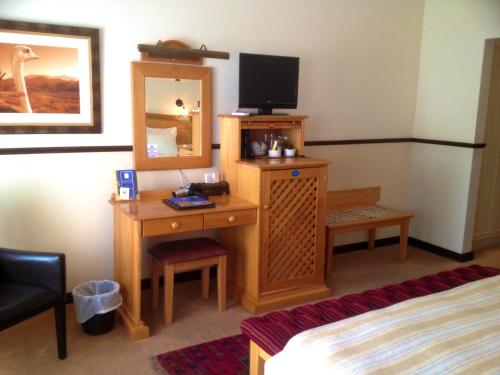 Televisyen dan/atau pusat hiburan di Turnberry Boutique Hotel