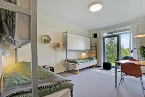 Postel nebo postele na pokoji v ubytování Danhostel Kolding