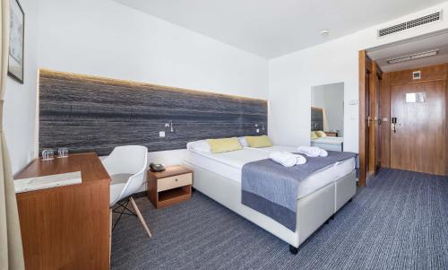 Posteľ alebo postele v izbe v ubytovaní Hotel Punta
