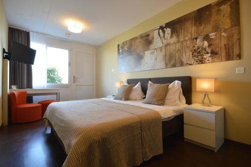 Postel nebo postele na pokoji v ubytování Hotel Bodensee-Arena