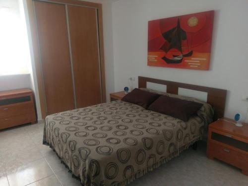 Cama o camas de una habitación en Apartamento en Playa Levante Coblanca 8