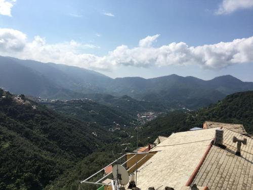a view of a mountain valley from a building at Cinqueterre - Terrace and beautiful view in Levanto