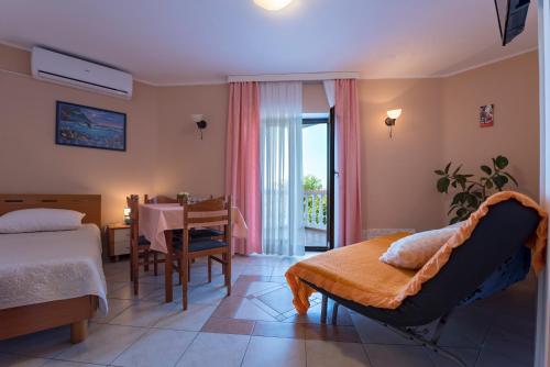 Postel nebo postele na pokoji v ubytování Hotel Aurora