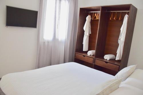 Ένα ή περισσότερα κρεβάτια σε δωμάτιο στο Petra Maris B&B