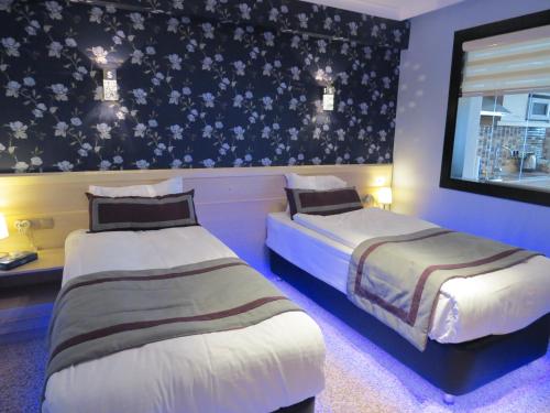 Кровать или кровати в номере Tempo Residence Comfort Izmir