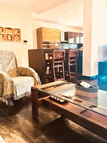 a living room with a couch and a coffee table at Villa Lydia in Nydri
