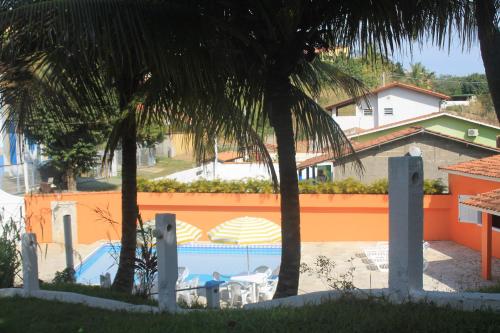 Pousada Sol do Araçáの敷地内または近くにあるプール