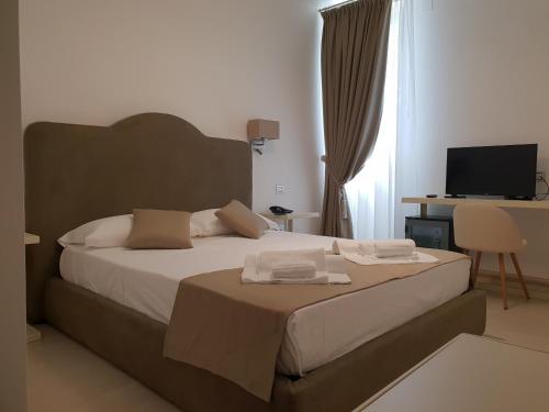 Ένα ή περισσότερα κρεβάτια σε δωμάτιο στο Villa Natia
