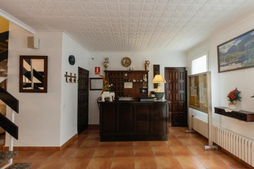 a living room with a coffered ceiling at Mallorca Boutique Hotel in Malgrat de Mar